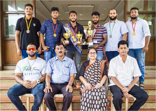 Sitting from Right: Fr. Kinley D’ Cruz (Director), Dr. Neena S. P. Panandikar (Principal), Dr. A R Barreto (DPES), Mr. Nevedh Shetkar (Coach) Standing from Right: Pranav Khedekar, Yash Shikant Ajgaonkar, Gautam Zangli, Rajat Chipkar, Kaviraj Rane, Allson Dias 